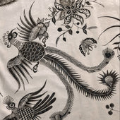 Black floral and bird patterns on a beige background