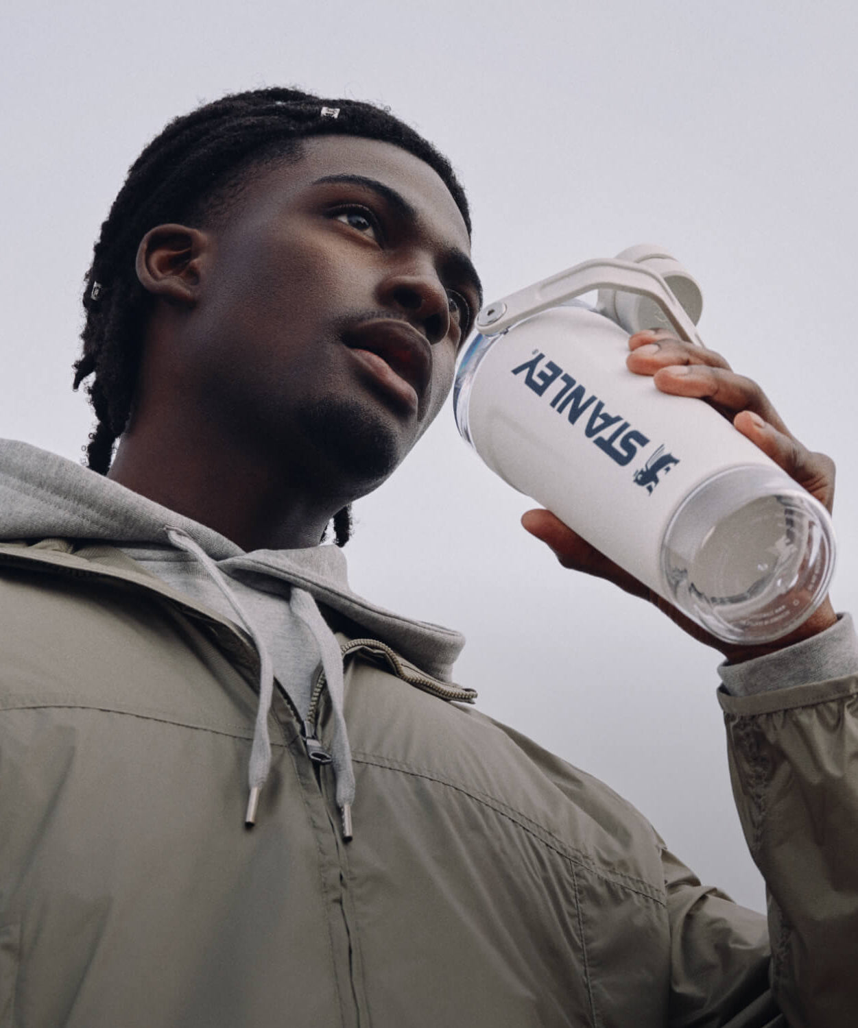 Person holding a Stanley Shaker against a neutral background